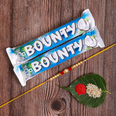 Pearl and Beads Rakhi With Bounty Coconut Filled Chocolate