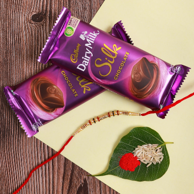 White Pearl Rakhi With Dairy Milk Silk Chocolate