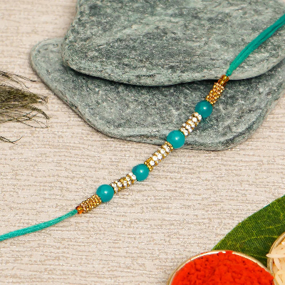 Golden Blue Pearl Rakhi