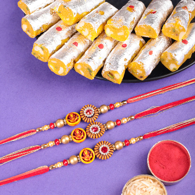 Red Stone Set Of 3 Rakhi With Kaju Roll