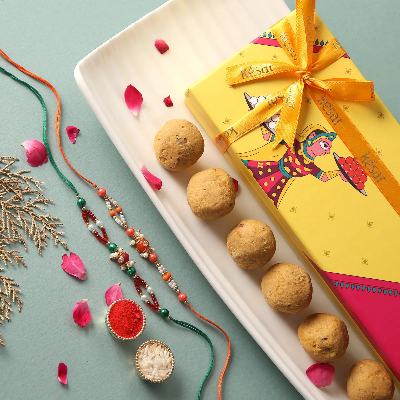 Sneh Colourful Beads Rakhi Set N Kesar Sweets Box